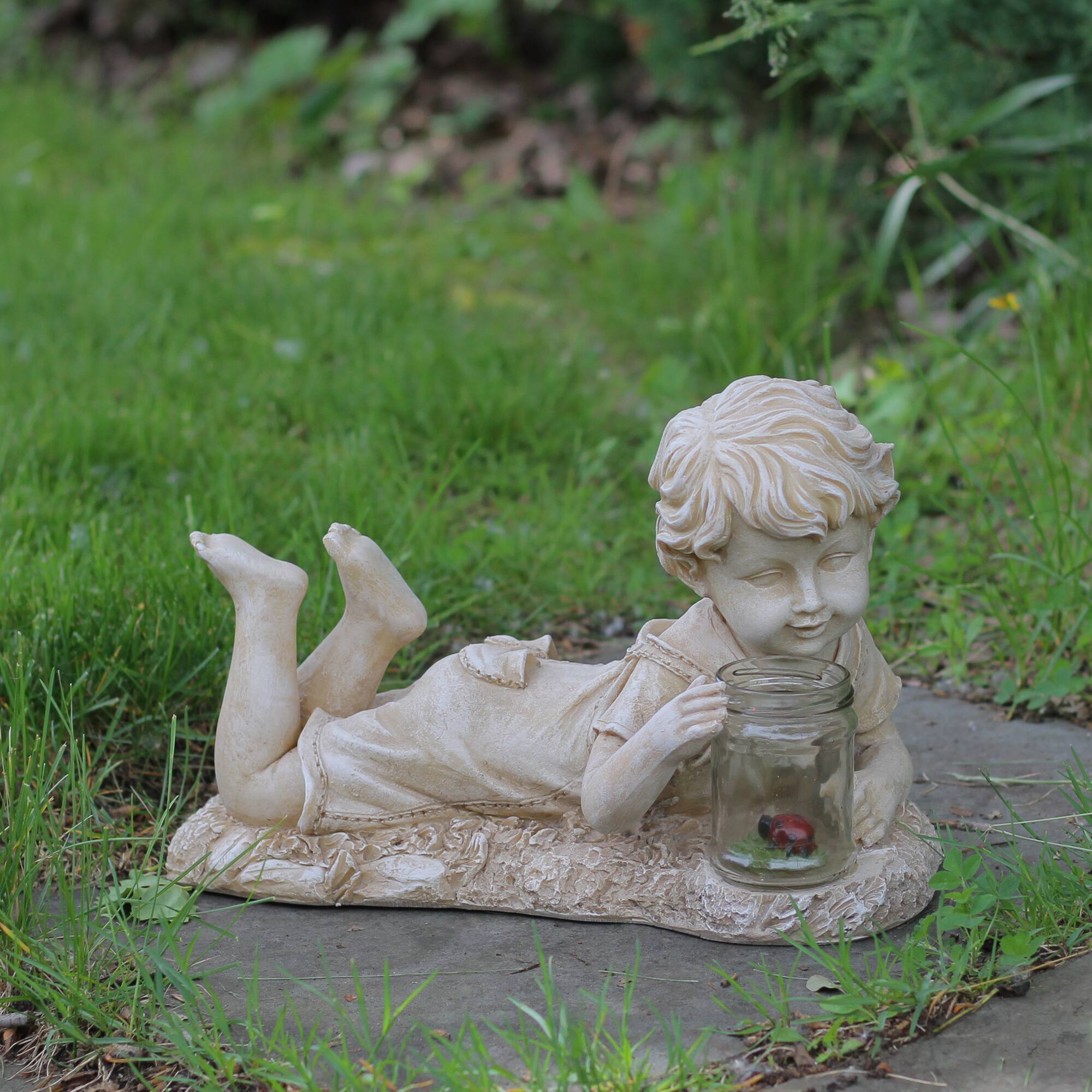 14.5" LED Lit Solar Powered Lounging Boy Outdoor Garden Statue